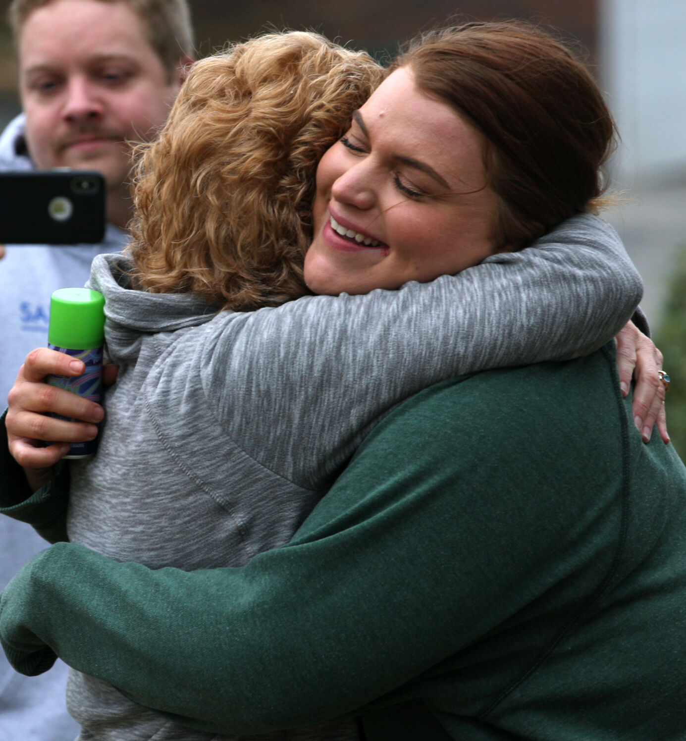 Kelli Strubberg hugs her mother, Kim Strubberg
